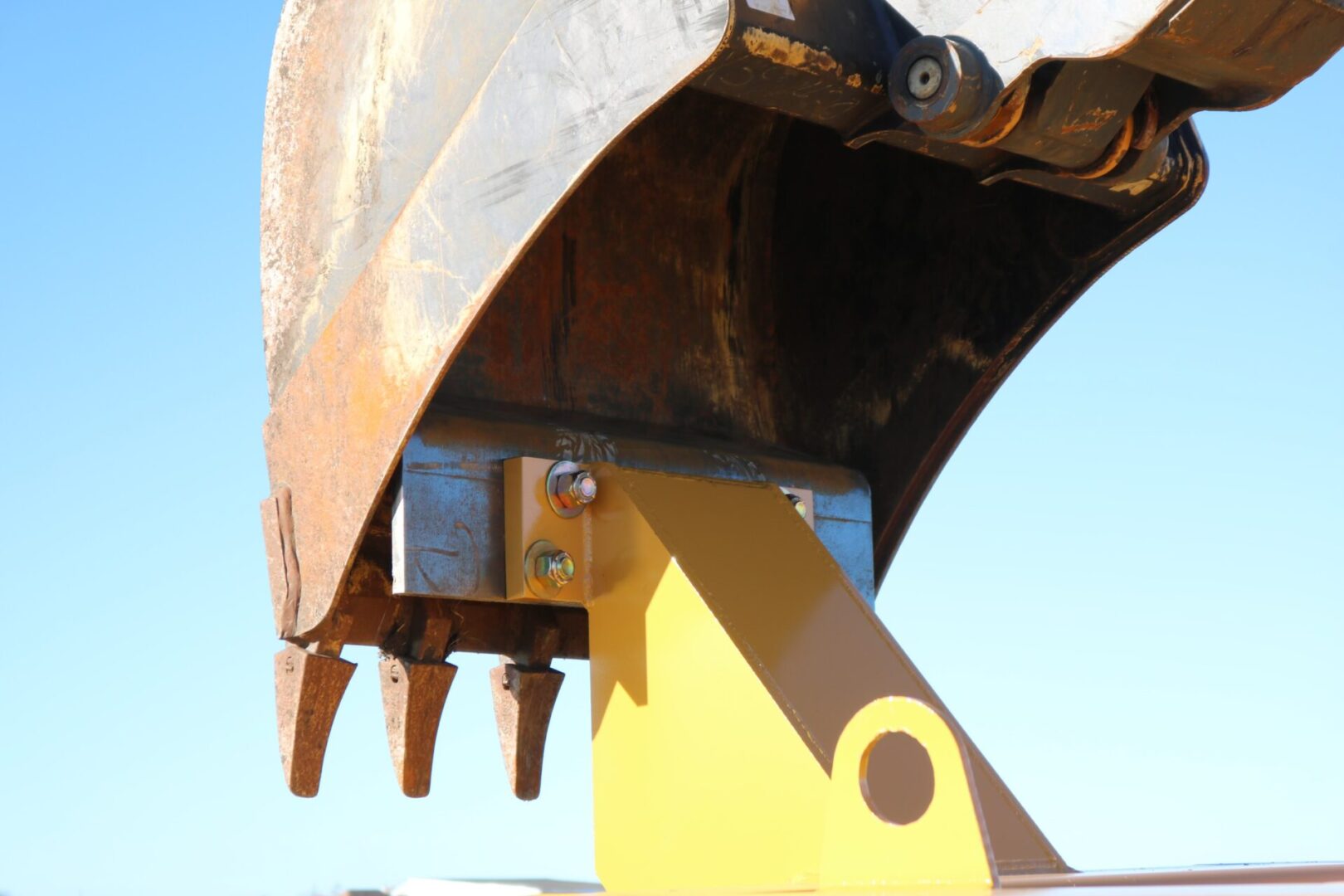 Excavator bucket using Bucket Bozz Cleaning Tool